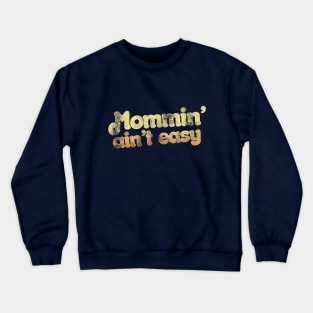 Mommin' ain't easy Crewneck Sweatshirt